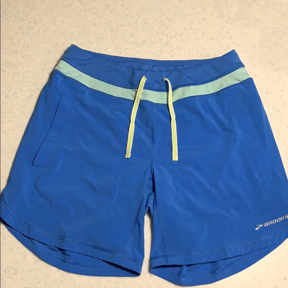 Brooks blue women’s long running shorts. Small